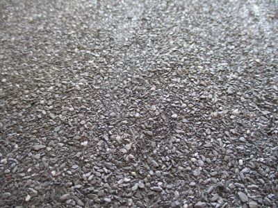 Get a Durable and Low Maintenance Surface with Tar and Chip Installation!